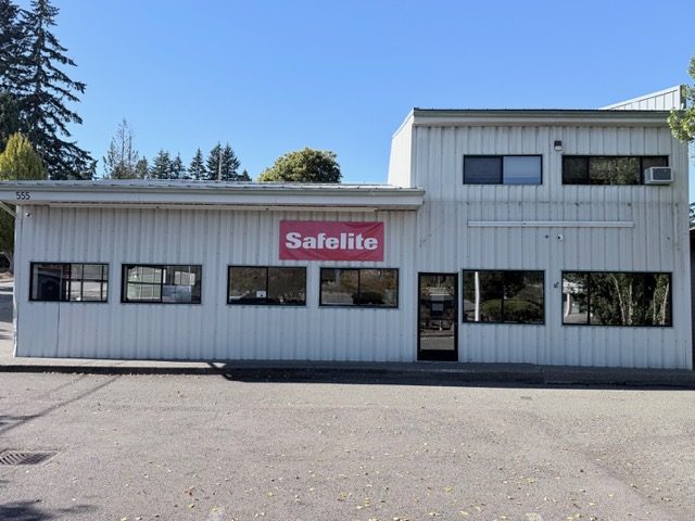 The former Auto Glass Plus building at 555 Bruenn Ave with a Safelite banner